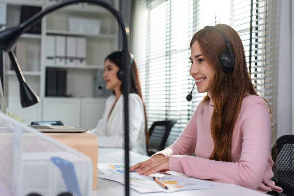 asian beautiful businesswoman call center working in office corporate